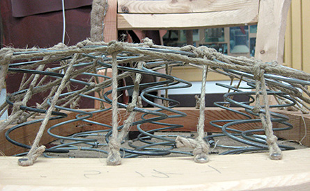 Istuimen jousittaminen